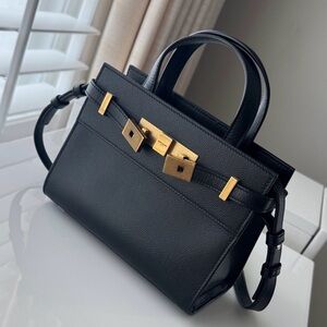 Yves Saint Laurent Black Satchel with Gold Accents